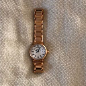 Rose gold Coach watch